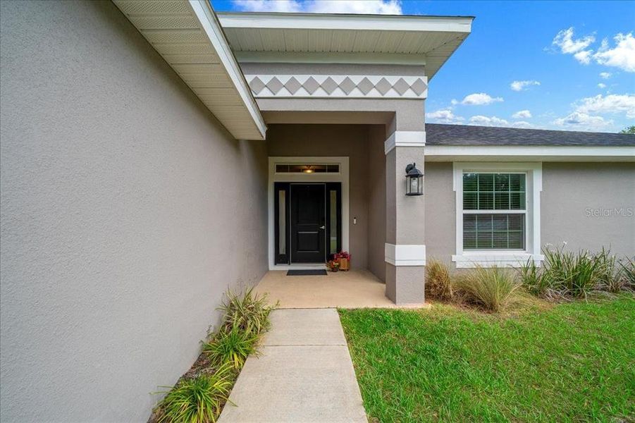 Exterior details and patio area of a home in , Ocala (Image 27).