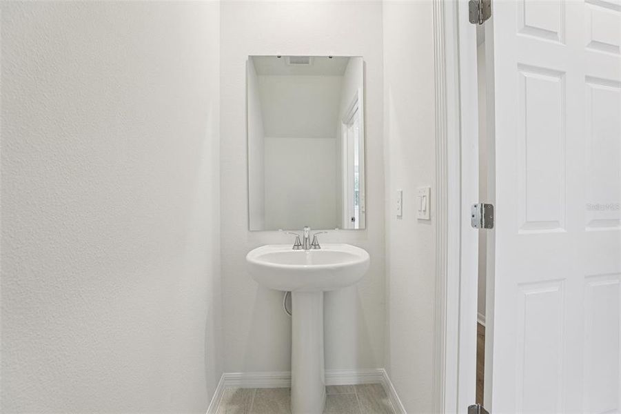 Furnished interior view inside a new home in Cagan Crossings West, Clermont (Image 6).