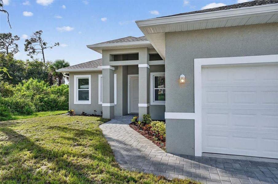 Exterior details and patio area of a home in , North Port (Image 26).