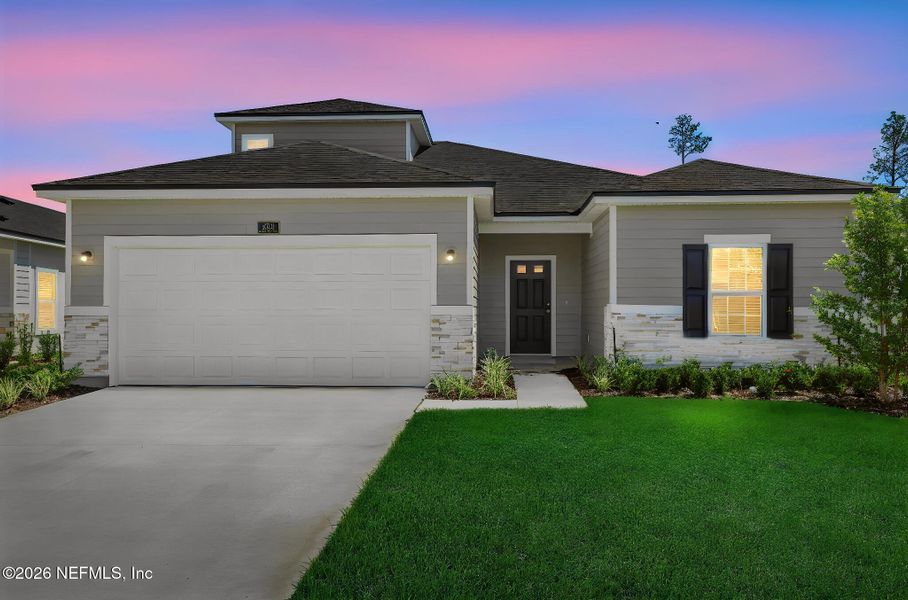 Front exterior of a new home in Cordova Palms, St. Augustine, FL, highlighting curb appeal (Image 2). Front exterior of a new home in Cordova Palms, St. Augustine, FL, highlighting curb appeal (Image 2).
