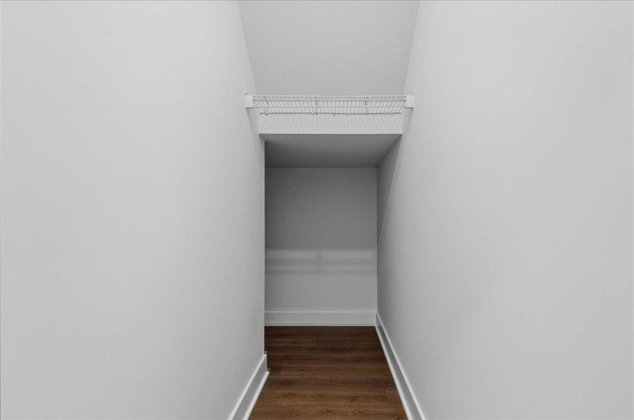 Spacious, unfurnished interior of a new home in The Coves at Lakes of Cane Bay, Summerville (Image 22).