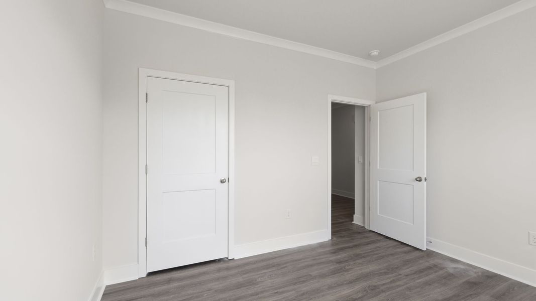 Spacious, unfurnished interior of a new home in Reserve at Tap Root Farms, Fletcher (Image 15). Spacious, unfurnished interior of a new home in Reserve at Tap Root Farms, Fletcher (Image 15).