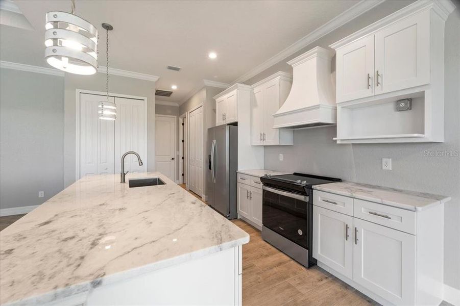 Furnished interior view inside a new home in , Port Charlotte (Image 11).
