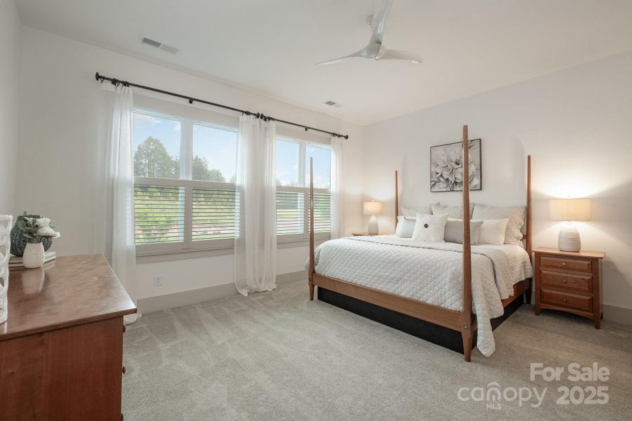 Large Primary Bedroom Suite overlooking the private rear yard Large Primary Bedroom Suite overlooking the private rear yard