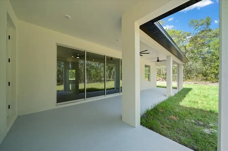 Exterior details and patio area of a home in , Weeki Wachee (Image 4). Exterior details and patio area of a home in , Weeki Wachee (Image 4).