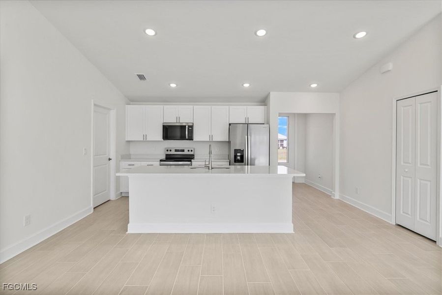 Furnished interior view inside a new home in Cape Coral, Cape Coral (Image 12). Furnished interior view inside a new home in Cape Coral, Cape Coral (Image 12).