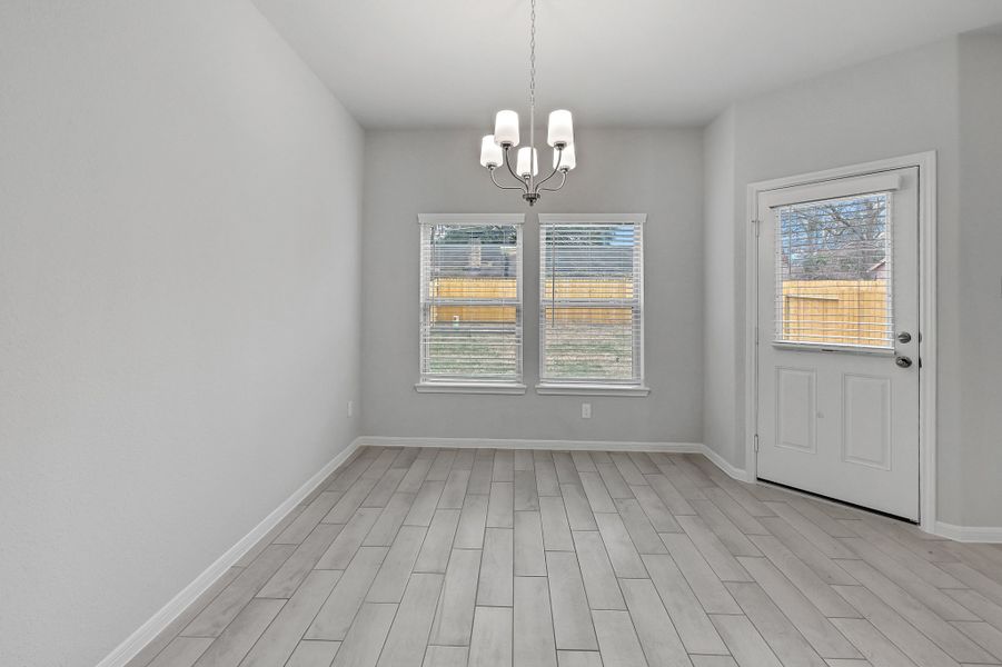 Representative unfurnished interior of a home built from the Floor Plan 1597 by Colina Homes in Rollingbrook Estates, Baytown (Image 17).