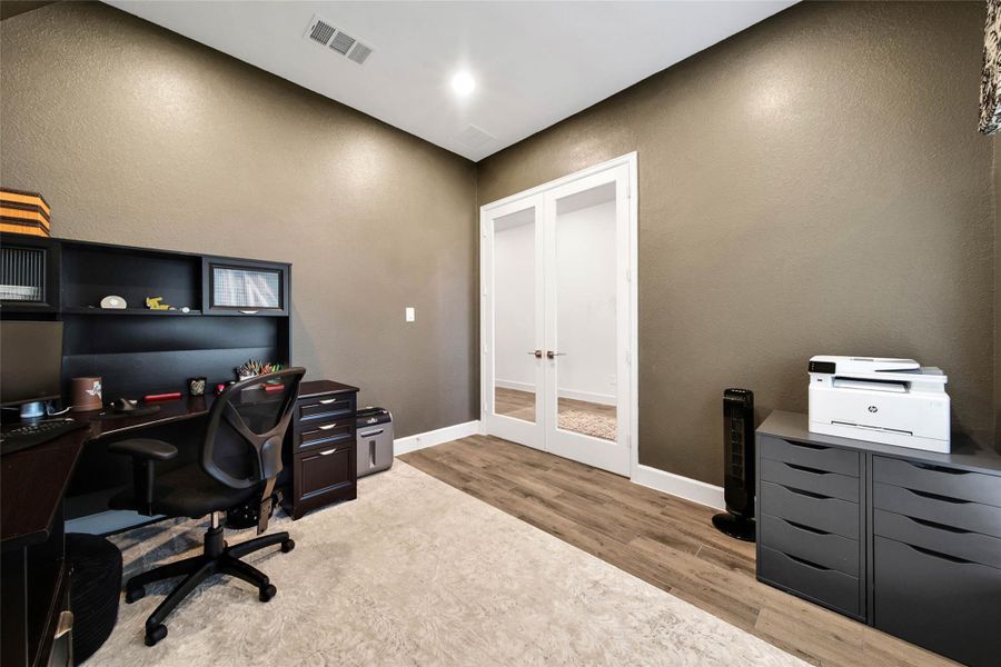 Glass doors for added privacy—ideal for working from home or managing household needs.