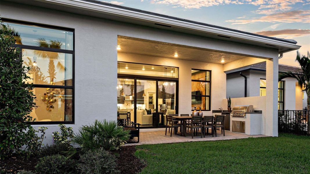 Exterior details and patio area of a home in Cresswind Palm Beach at Westlake, Westlake (Image 24).