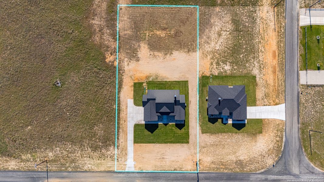 Front exterior of a new home in , La Vernia, TX, highlighting curb appeal (Image 32).