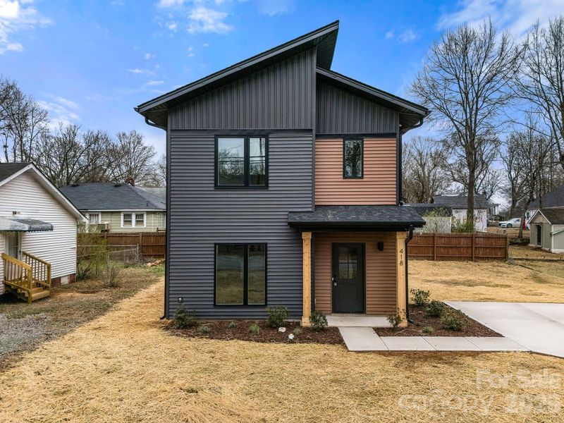 Front exterior of a new home in , Kannapolis, NC, highlighting curb appeal (Image 14). Front exterior of a new home in , Kannapolis, NC, highlighting curb appeal (Image 14).