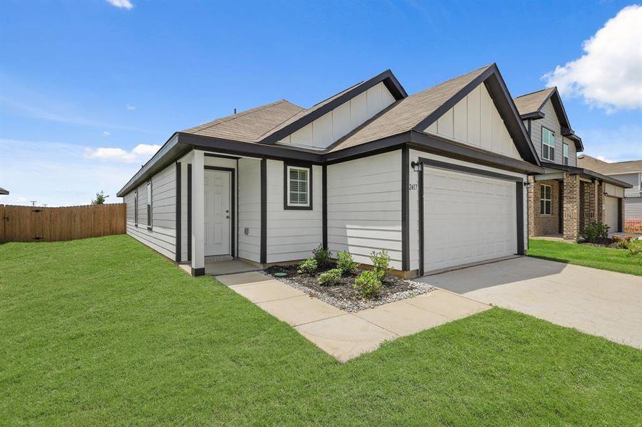 Front exterior of a new home in Sycamore Landing, Fort Worth, TX, highlighting curb appeal (Image 2). Front exterior of a new home in Sycamore Landing, Fort Worth, TX, highlighting curb appeal (Image 2).