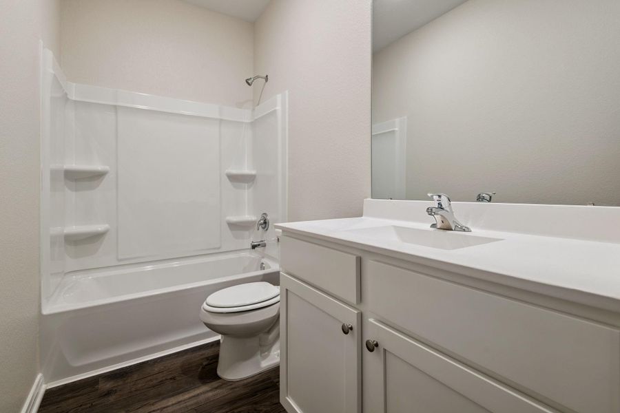 Furnished interior view inside a new home in Sweetwater Ridge, Conroe (Image 9).