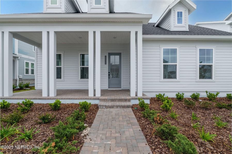 Exterior details and patio area of a home in Seven Pines 50' Rear Entry, Jacksonville (Image 3).