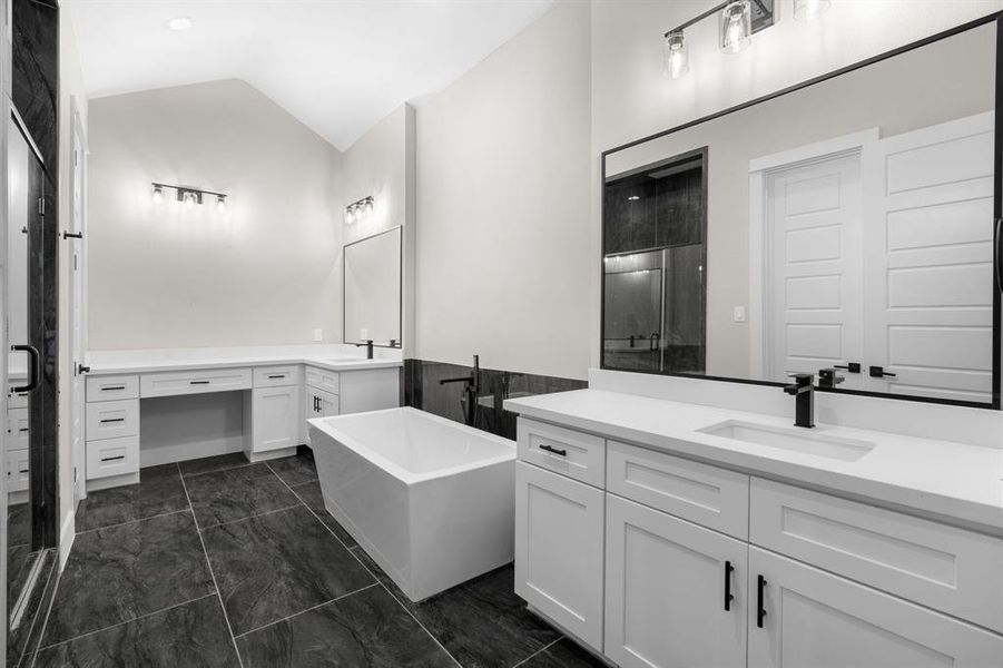 Master bathroom. Double sinks and vanity area.