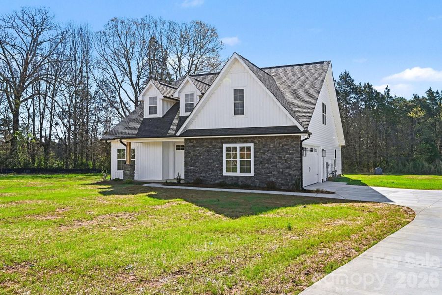 Front exterior of a new home in , Salisbury, NC, highlighting curb appeal (Image 24).