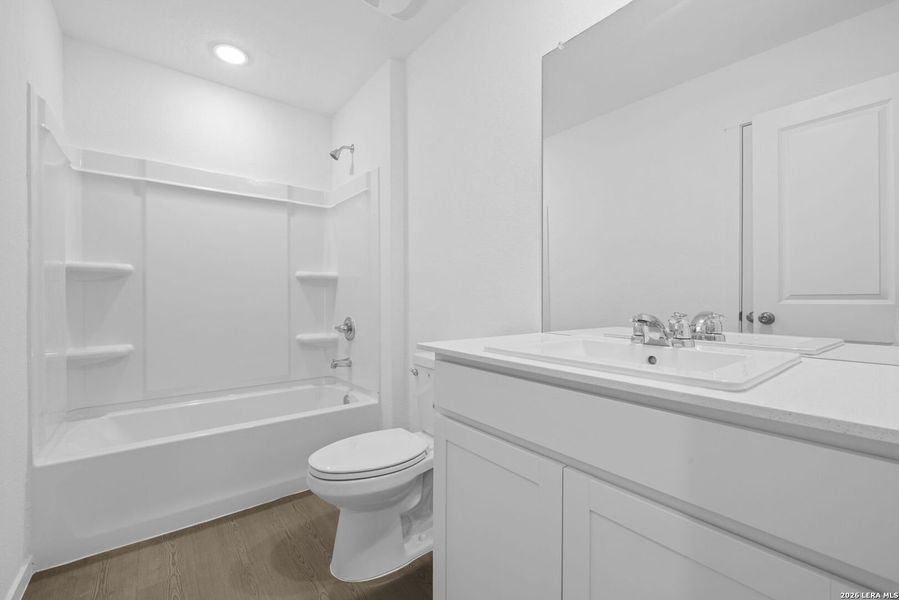 Furnished interior view inside a new home in Voss Farms, New Braunfels (Image 5).