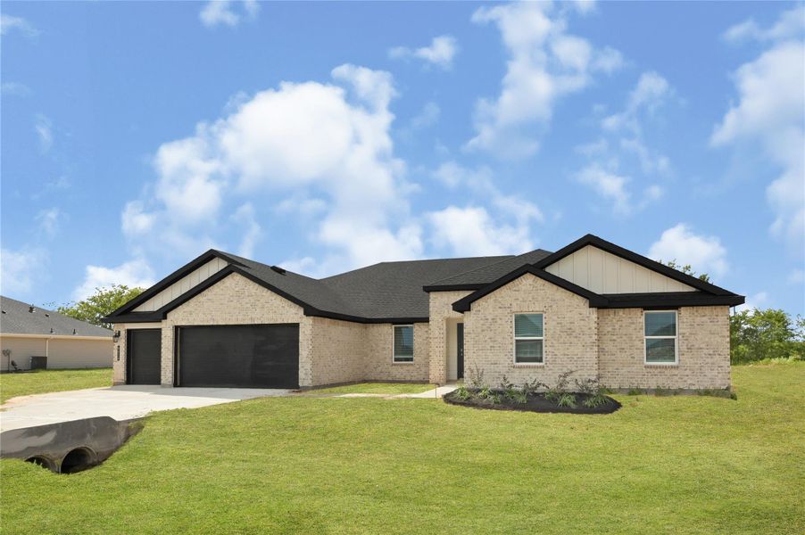 Front exterior of a new home in Blue Heron Estates, Beasley, TX, highlighting curb appeal (Image 20).