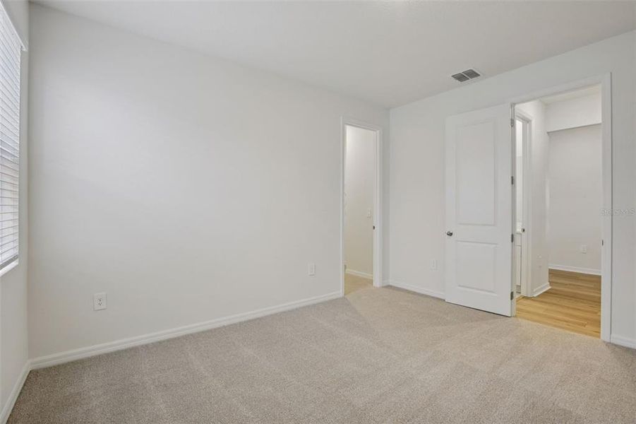 Spacious, unfurnished interior of a new home in Coasterra - Reserve Series, Palmetto (Image 37).