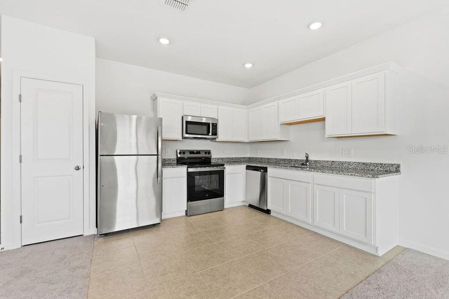 Furnished interior view inside a new home in , Davenport (Image 6).