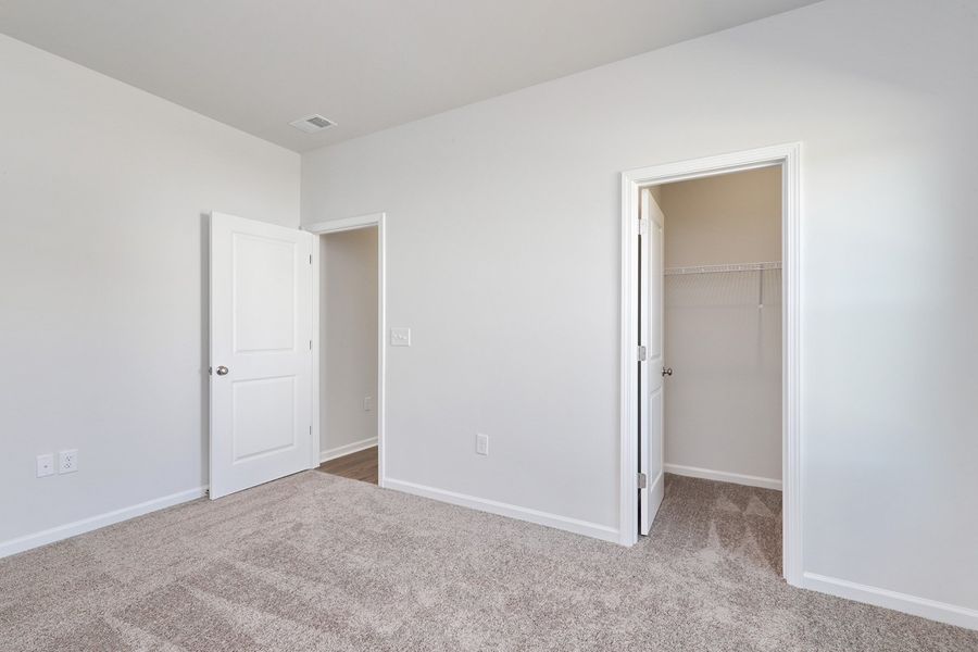 Spacious, unfurnished interior of a new home in Jordan Grove, Conway (Image 27). Spacious, unfurnished interior of a new home in Jordan Grove, Conway (Image 27).