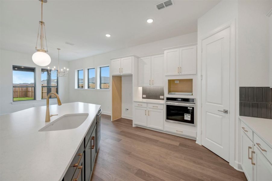 Furnished interior view inside a new home in Riceland - Enclave Row Collection, Mont Belvieu (Image 7).