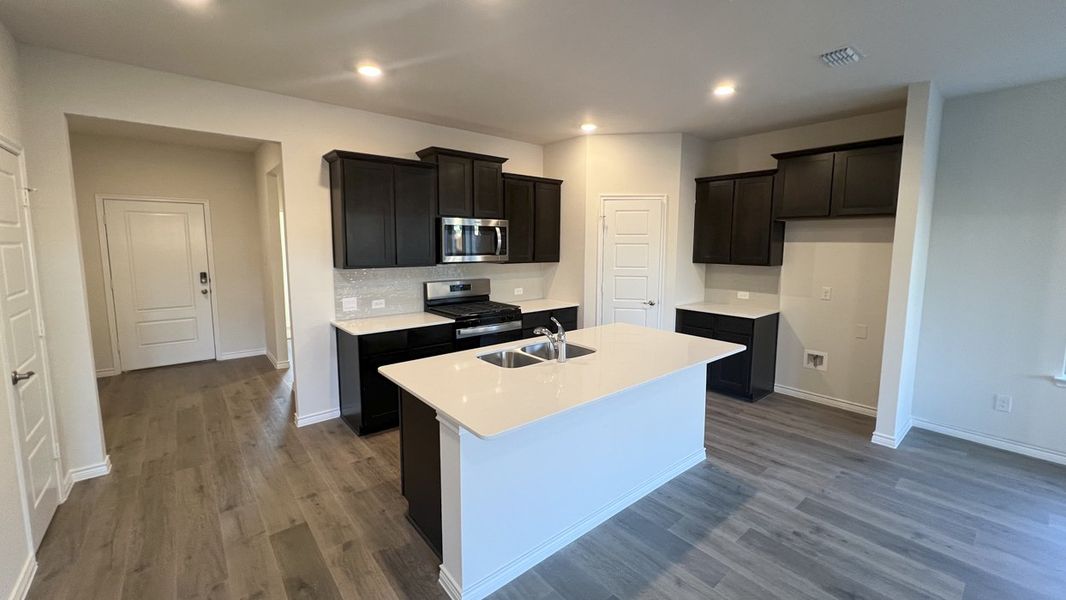 Representative furnished interior of a home built from the Copaiba by D.R. Horton in Silverado, Aubrey (Image 4).