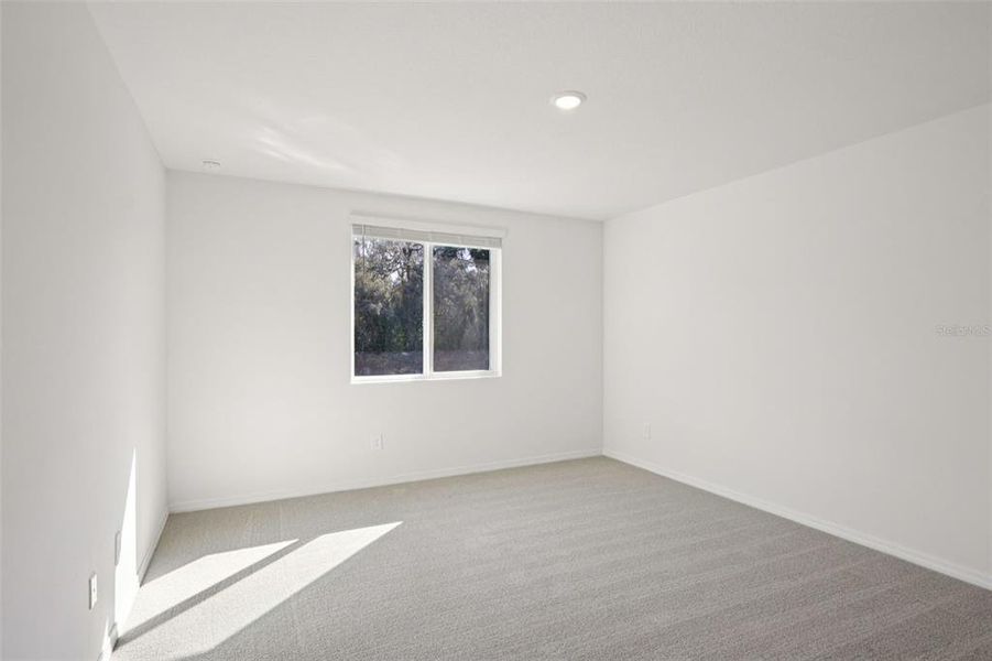 Spacious, unfurnished interior of a new home in Leyland Preserve - Classic Series, Brooksville (Image 24).