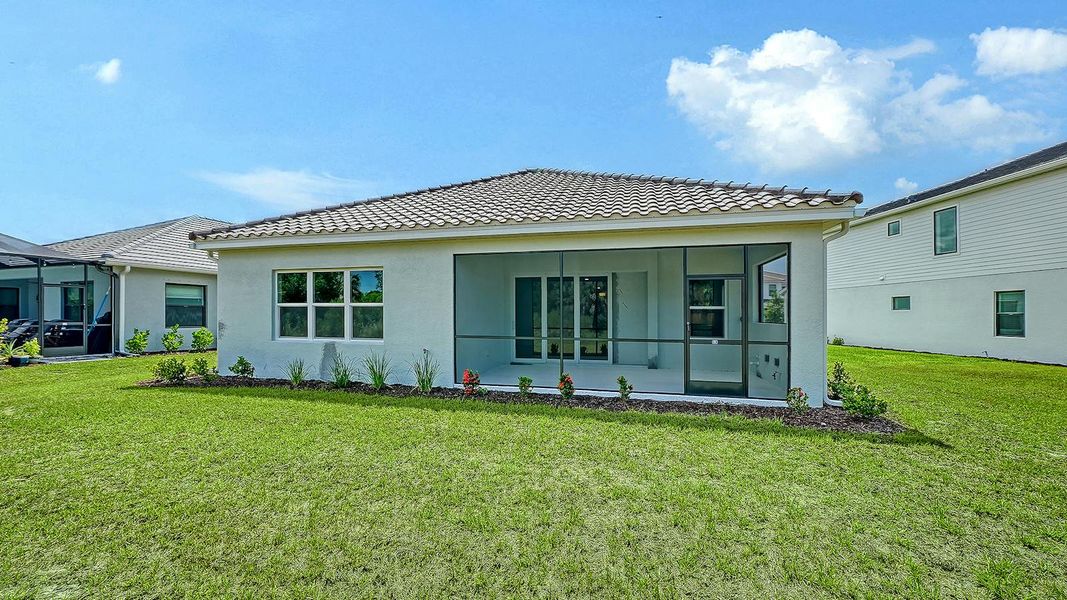 Exterior details and patio area of a home in Grand Park Real Estate and Homes for Sale in Sarasota, FL - Neal Communities, Sarasota (Image 24).
