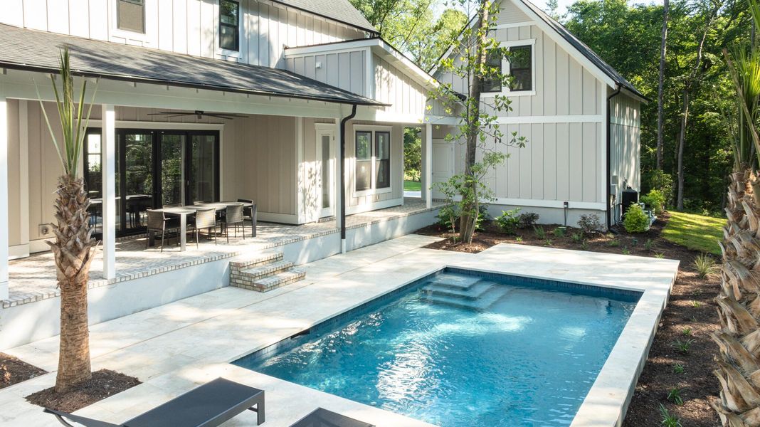 Exterior details and patio area of a home in Yellow House Landing, Charleston (Image 4). Exterior details and patio area of a home in Yellow House Landing, Charleston (Image 4).