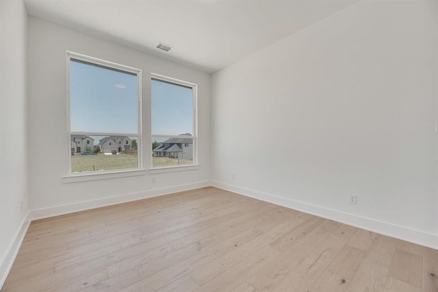 Spacious, unfurnished interior of a new home in Hillside Village, Celina (Image 17).