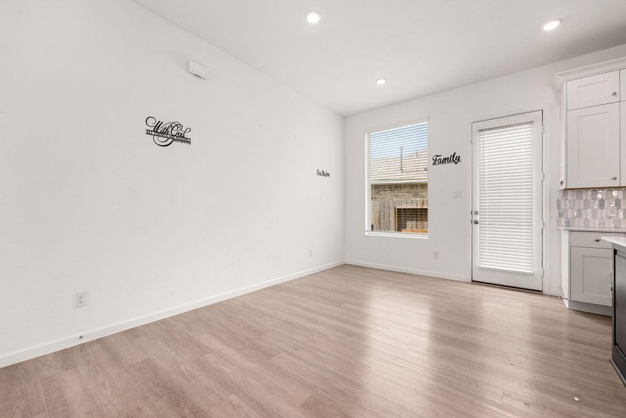 Spacious, unfurnished interior of a new home in Sunterra, Katy (Image 40).