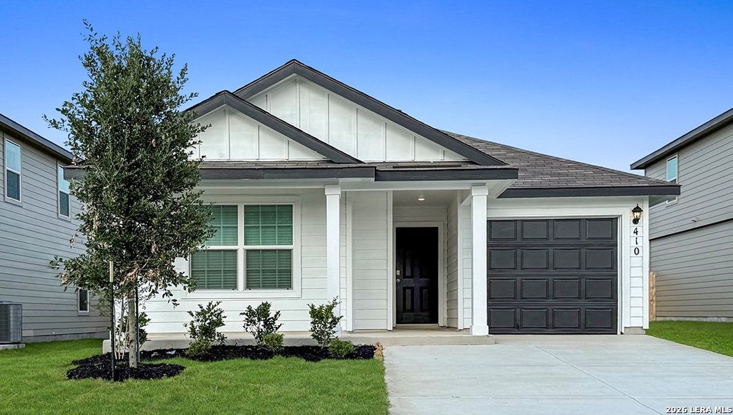 Front exterior of a new home in Redbird Ranch, San Antonio, TX, highlighting curb appeal (Image 2).