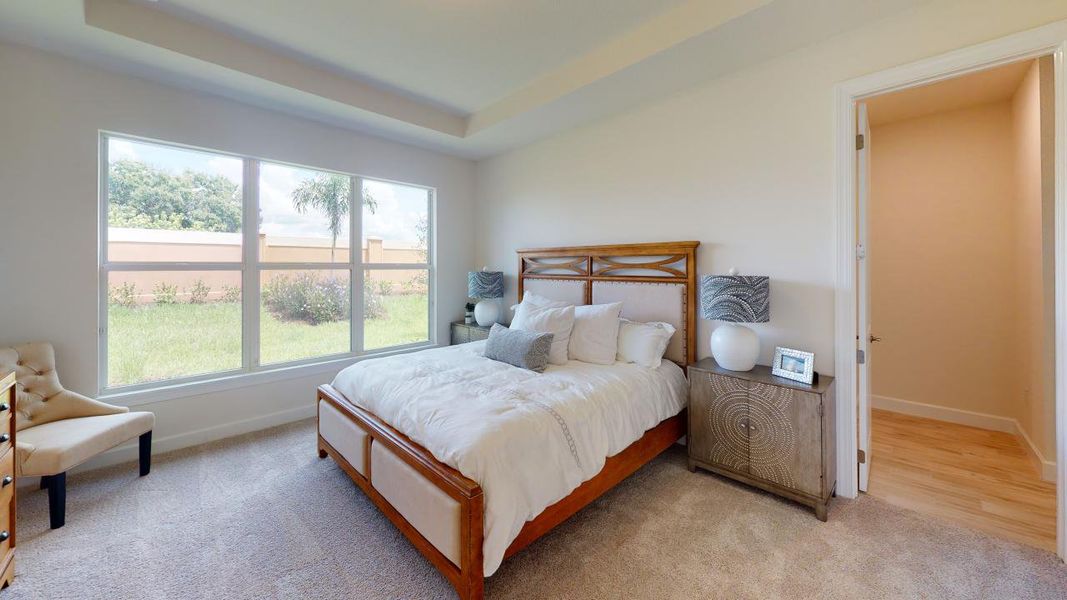 Furnished interior view inside a new home in Esplanade at Tradition, Port St. Lucie (Image 13).