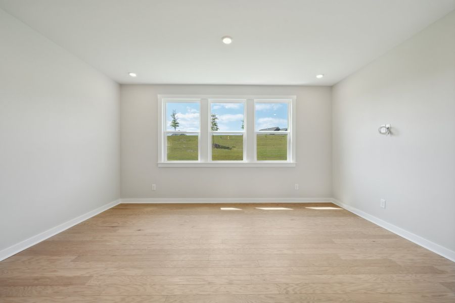 Representative unfurnished interior of a home built from the Rodanthe Premier by Taylor Morrison in Stafford at Langtree, Mooresville (Image 11).