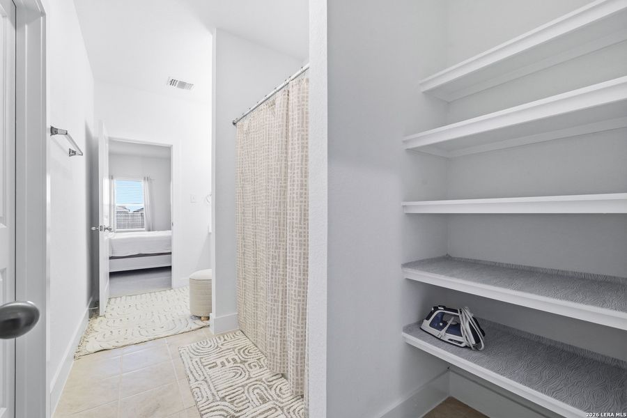Furnished interior view inside a new home in , Seguin (Image 13).