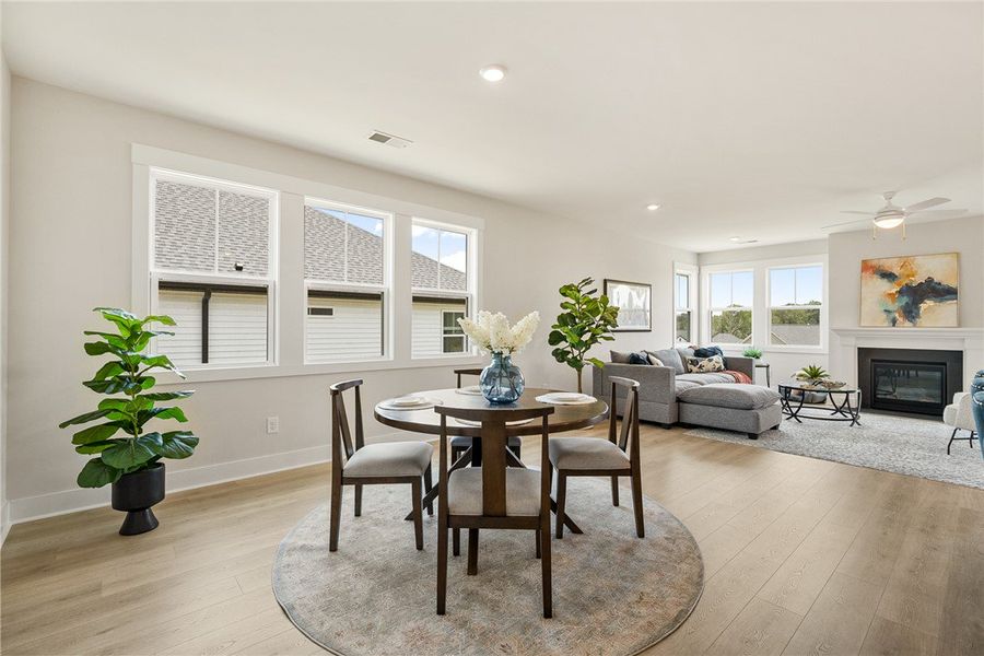 An inviting open-concept living space features lig An inviting open-concept living space features lig