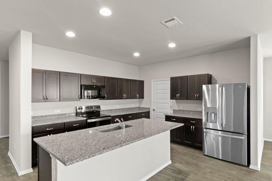 Furnished interior view inside a new home in Oaks at San Gabriel, Georgetown (Image 15).