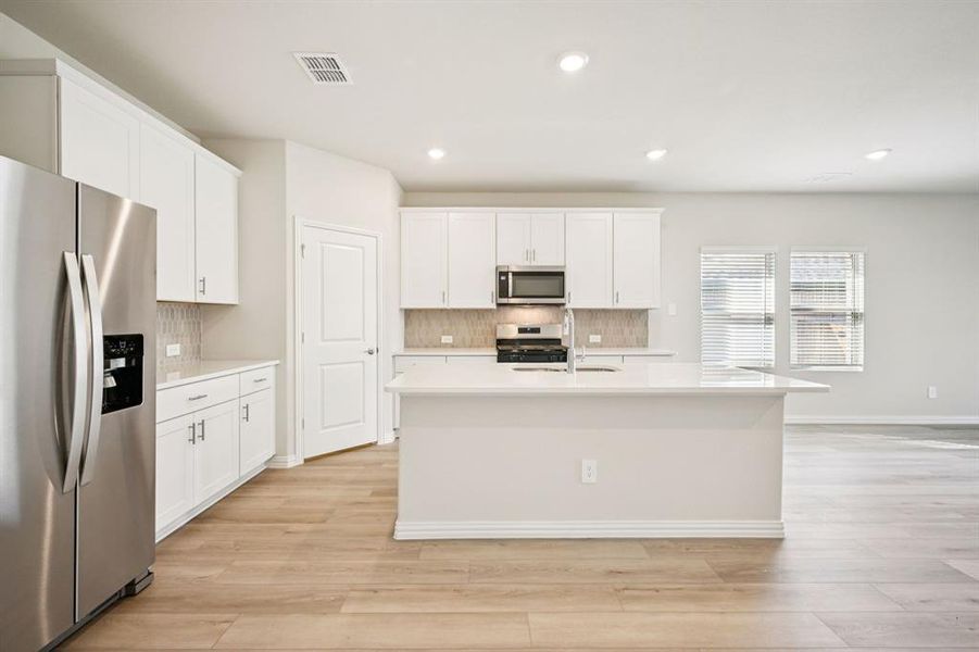 Photo is not of the actual home, but is an inspirational photo of builder’s model home and may depict options, furnishings, and/or decorator features that are not included.
