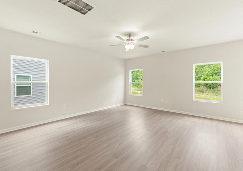 The living room has plenty of natural lighting!