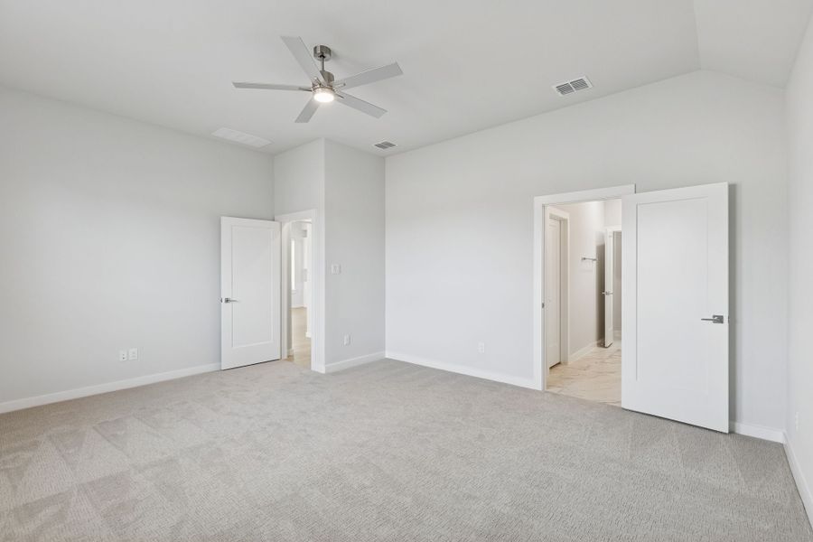 Primary Suite in the Stanley II home plan by Trophy Signature Homes – REPRESENTATIVE PHOTO