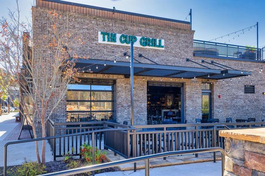 Front exterior of a new home in Hillshire, Cumming, GA, highlighting curb appeal (Image 31). Front exterior of a new home in Hillshire, Cumming, GA, highlighting curb appeal (Image 31).