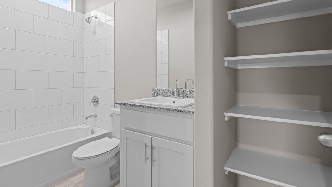 Representative furnished interior of a home built from the Southhaven by D.R. Horton in Legacy South, Midland (Image 7).