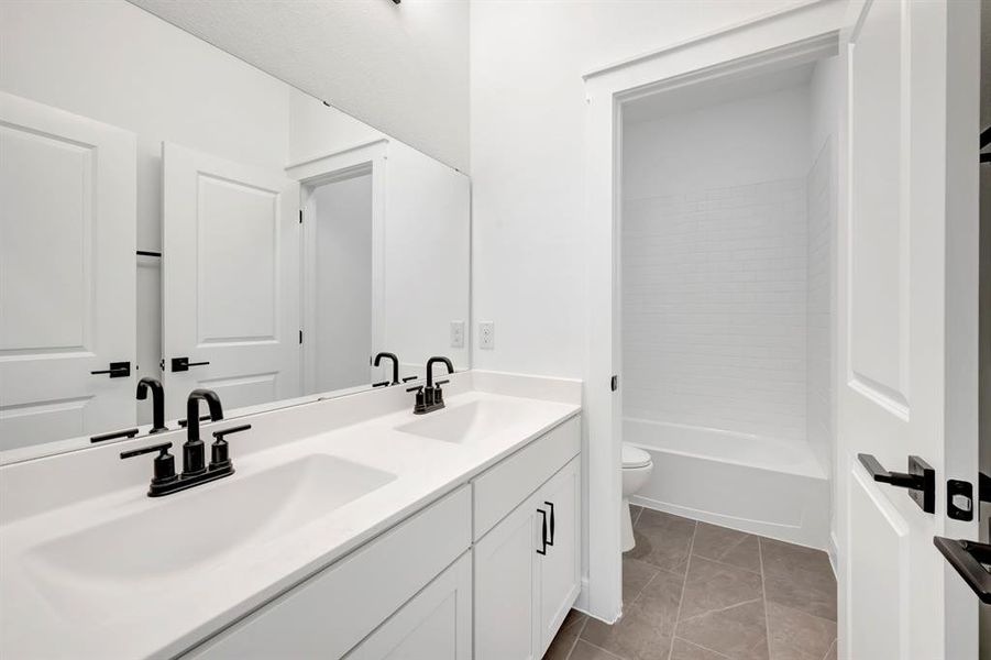 Furnished interior view inside a new home in Kreymer at the Park, Wylie (Image 6).
