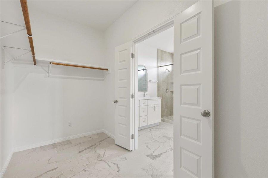 A spacious walk-in closet A spacious walk-in closet