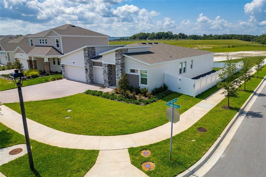 Front exterior of a new home in , Apopka, FL, highlighting curb appeal (Image 18).