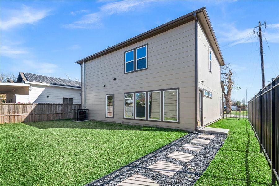 Exterior details and patio area of a home in , Houston (Image 4).
