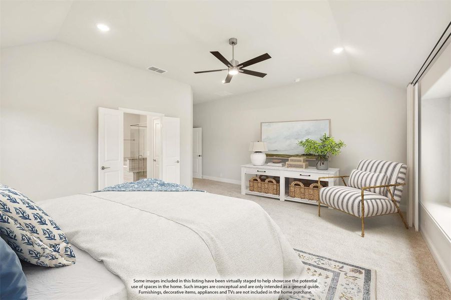 Spacious bedroom with ceiling fan, carpet flooring, and door leading to walk-in closet and bathroom