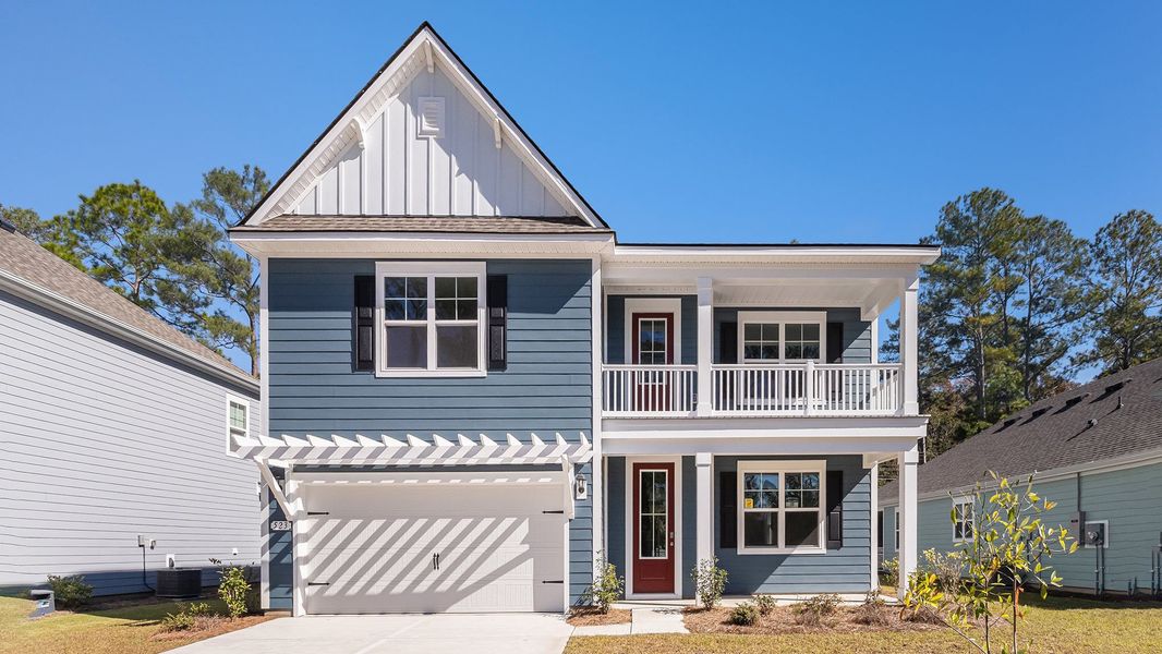 Front exterior of a new home in Eden Springs, Longs, SC, highlighting curb appeal (Image 2). Front exterior of a new home in Eden Springs, Longs, SC, highlighting curb appeal (Image 2).