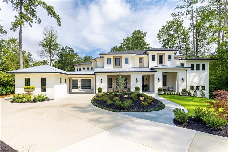 Front exterior of a new home in , Marietta, GA, highlighting curb appeal (Image 25).